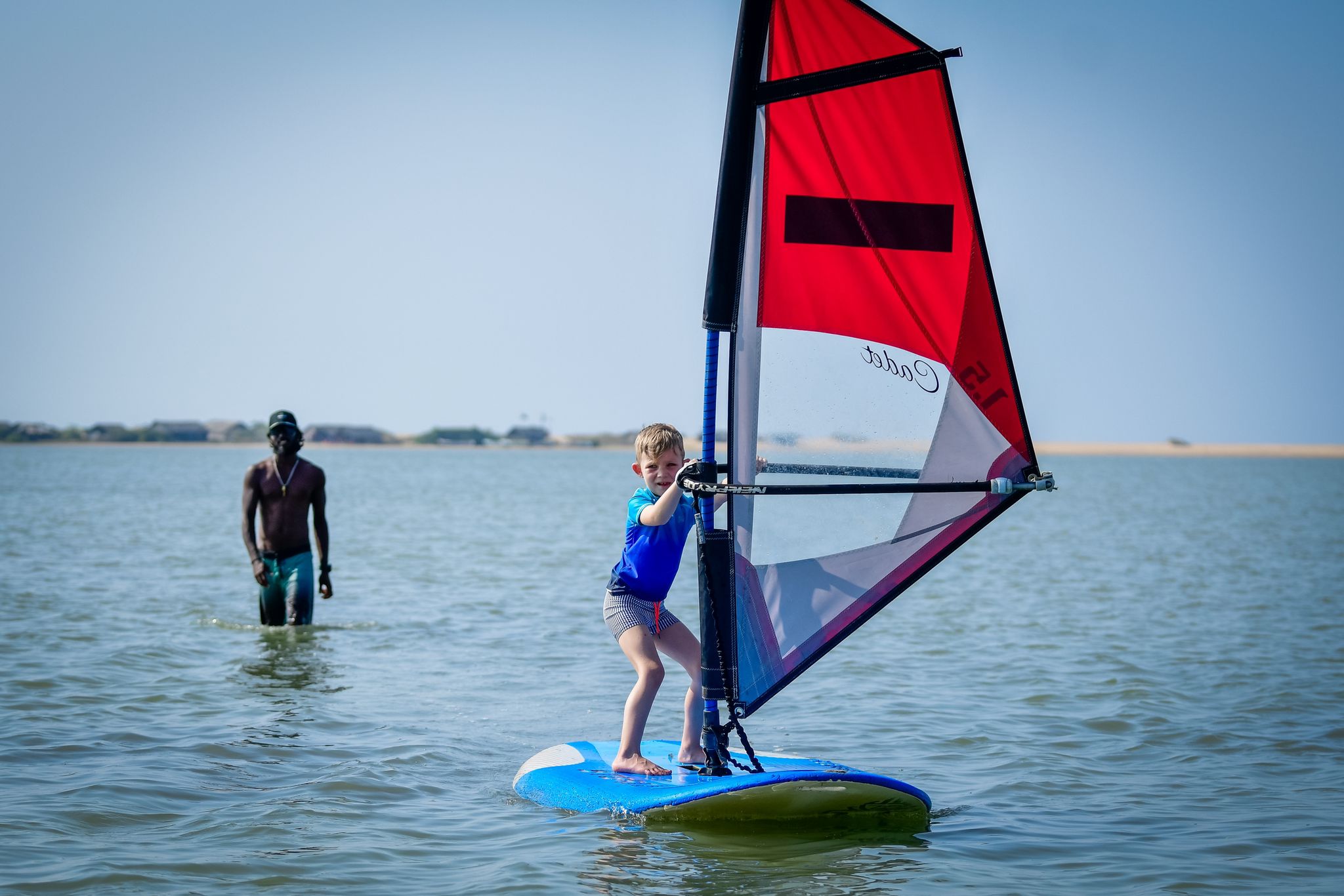 Kids windsurfing in Kalpitiya lagoon Sri Lanka